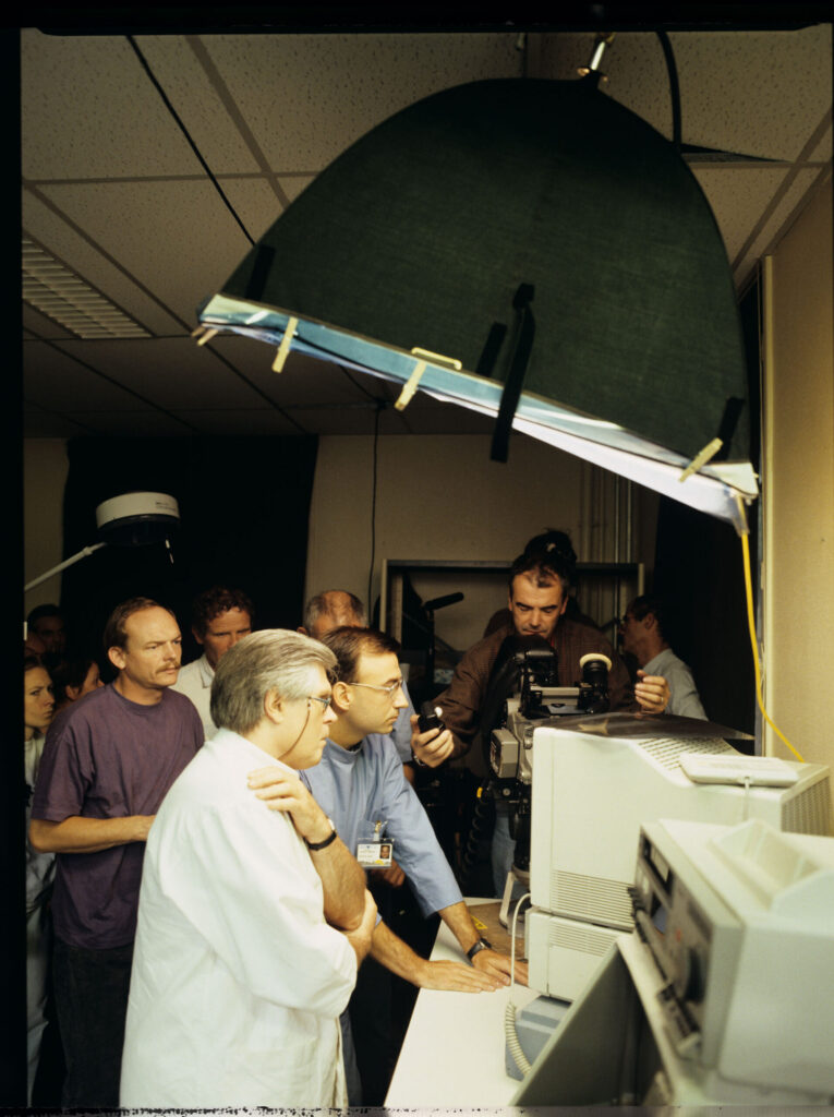 Preparations for filming a scene of monitoring a patient's vital signs in the intensive care unit of a hospital.