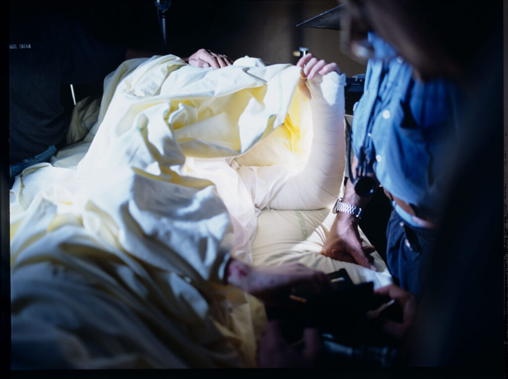Preparations for the shooting of the scene in which Julie watches the coverage of her husband and daughter's funeral on a TV.