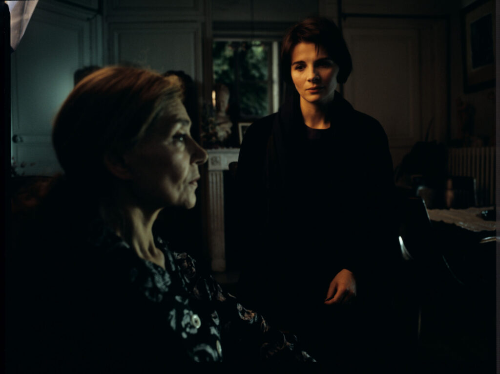 Olivier (Benoît Régent) calls out through the open window to Julie, who has left after spending the night together.