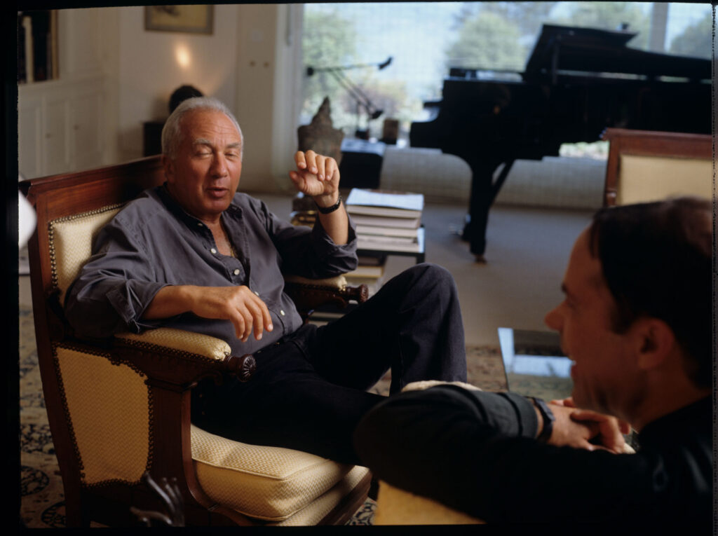A joint photograph of composer Patrice de Courcy (Hugues Quester) with Alexis Weissenberg, a pianist and musician.