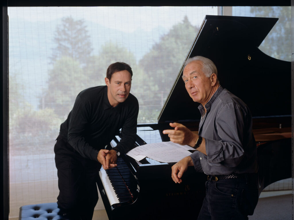 A joint photograph of composer Patrice de Courcy (Hugues Quester) with Alexis Weissenberg, a pianist and musician.
