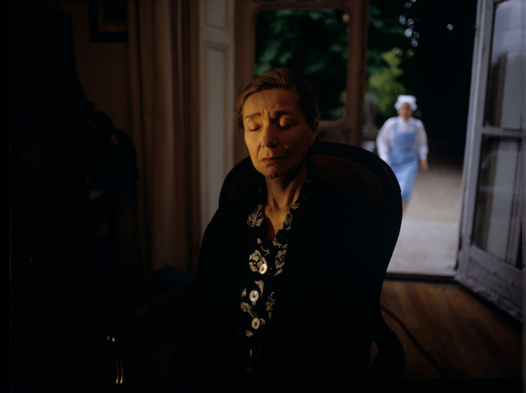 Julie’s mother (Emmanuelle Riva) in a nursing home during the final part of the scene.