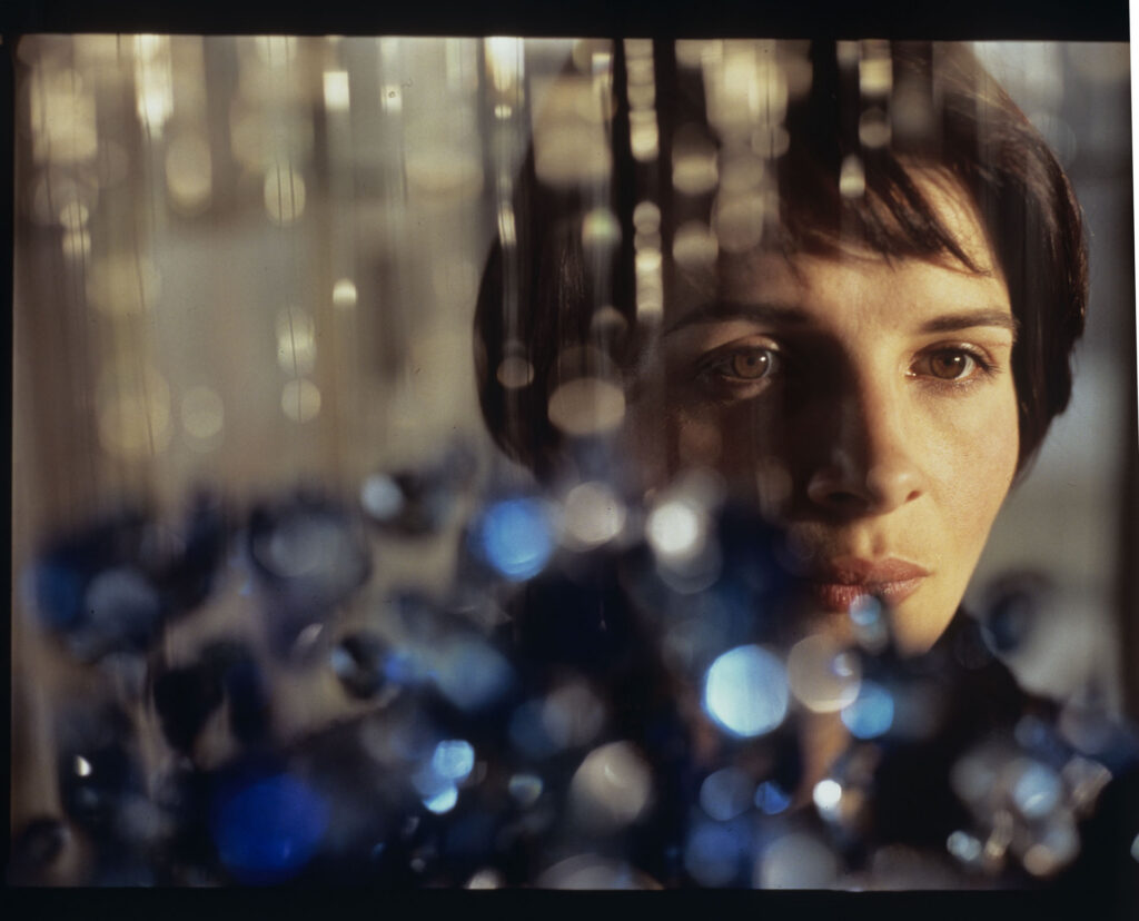 Julie (Juliette Binoche) and the blue chandellier - the only object Julie took from her husband's suburban house