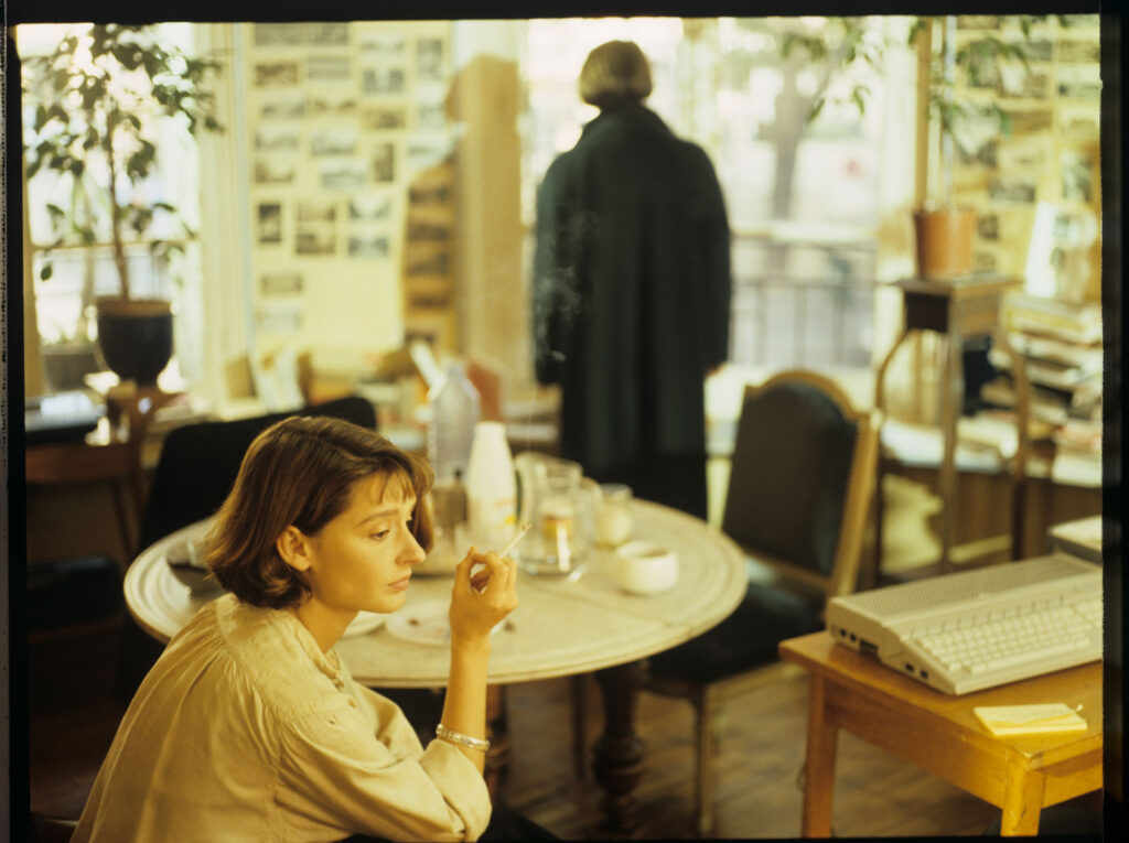 Julie (Juliette Binoche) and copier (Florence Vignon) talking about Patrice's unfinished composition.