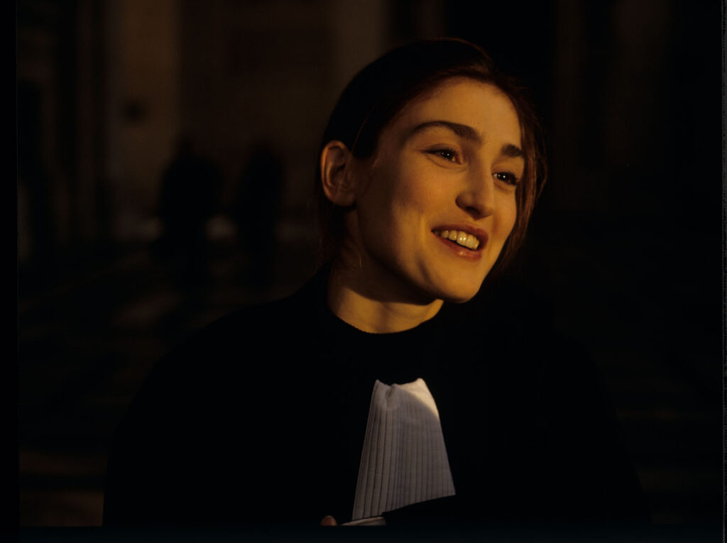 A lawyer at the Parisian Palace of Justice, whom Julie observes.