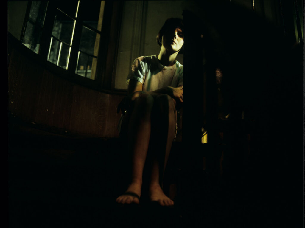 Julie (Juliette Binoche) spends the night in the stairwell.