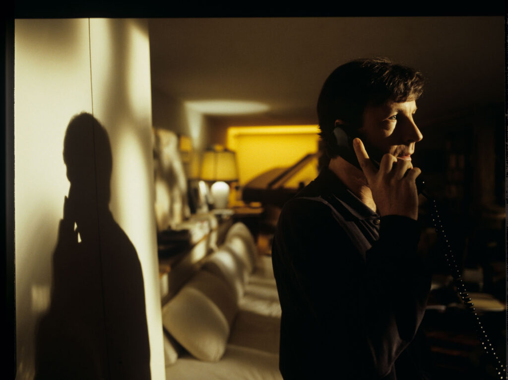 Olivier (Benoit Regent) during a telephone conversation with Julie.