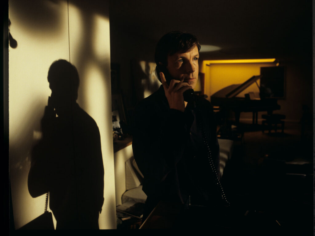 Olivier (Benoit Regent) during a telephone conversation with Julie.