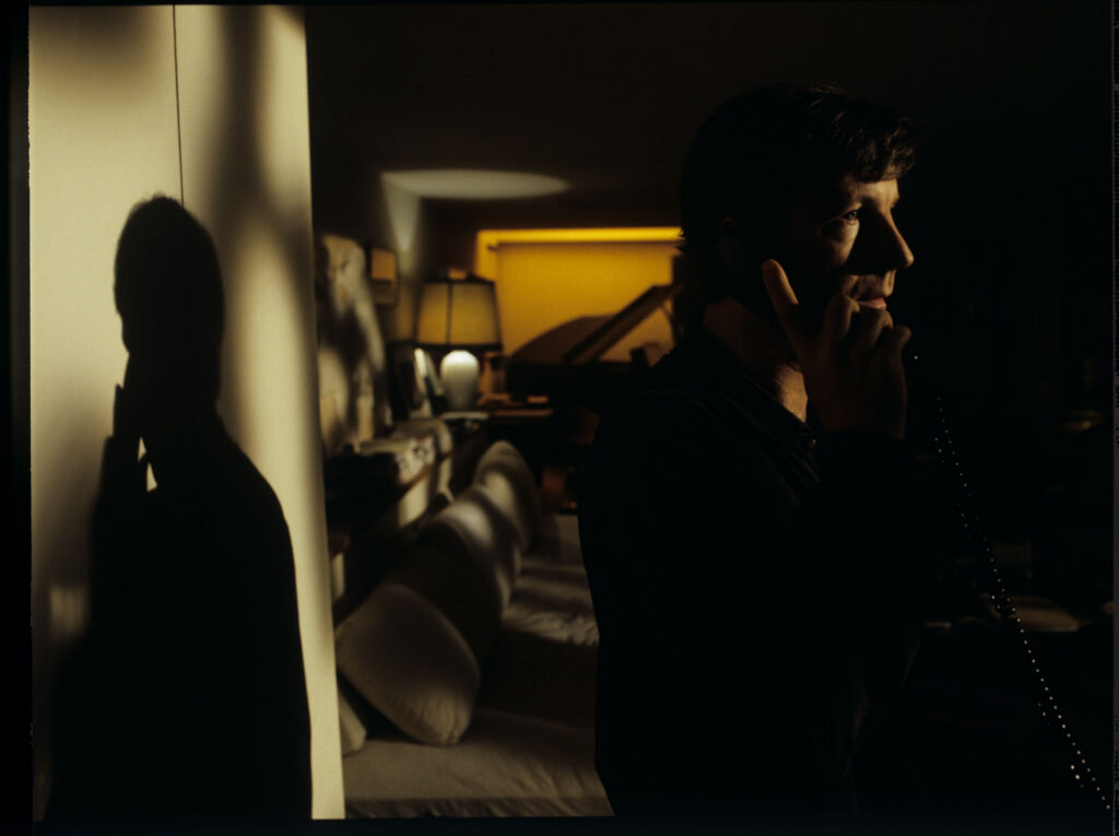 Olivier (Benoit Regent) during a telephone conversation with Julie.