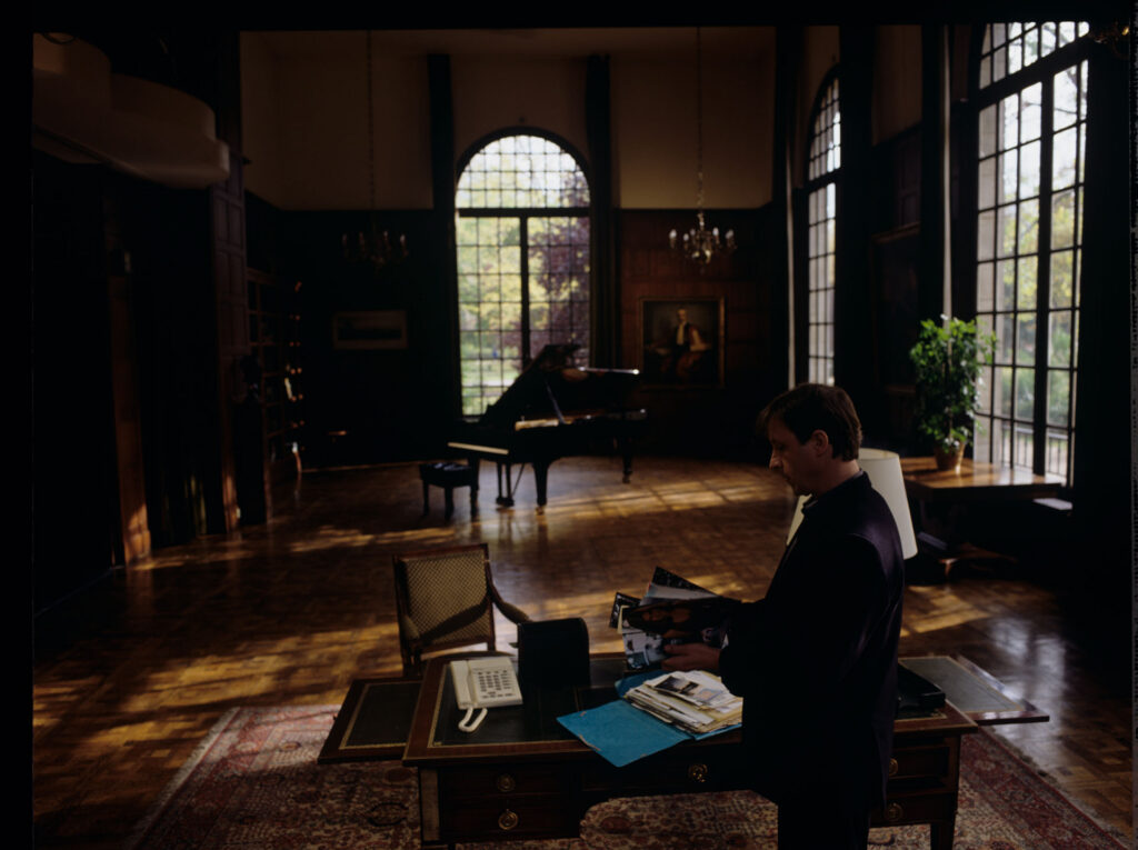 Olivier (Benoit Regent) holding a briefcase with documents of the tragically deceased Patrice de Courcy.