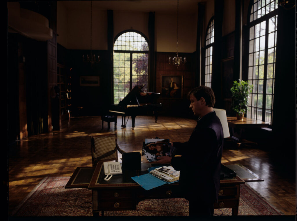 Olivier (Benoit Regent) holding a briefcase with documents of the tragically deceased Patrice de Courcy.
