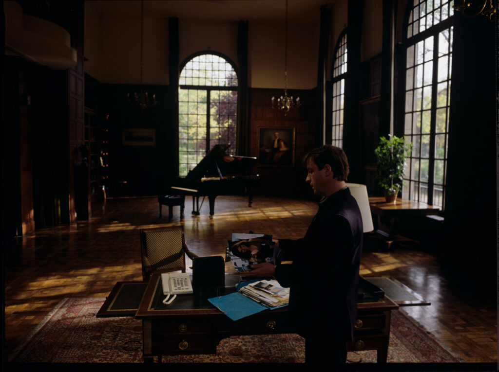 Olivier (Benoit Regent) holding a briefcase with documents of the tragically deceased Patrice de Courcy.