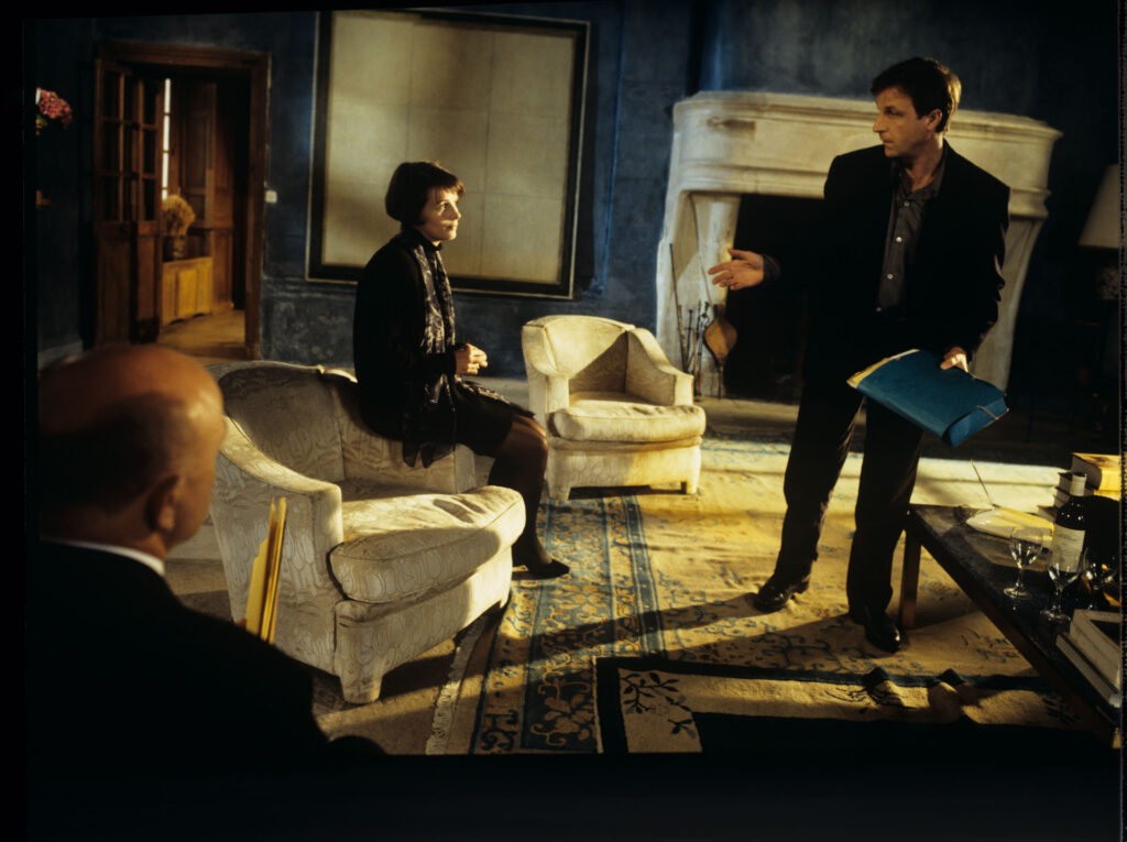 During Julie's (Juliette Binoche) meetings with her lawyer (Alain Decaux), Olivier (Benoit Regent) appears.