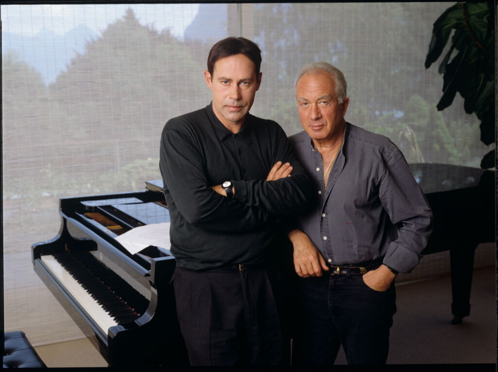 A joint photograph of composer Patrice de Courcy (Hugues Quester) with Alexis Weissenberg, a pianist and musician.