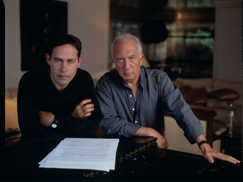 A joint photograph of composer Patrice de Courcy (Hugues Quester) with Alexis Weissenberg, a pianist and musician.