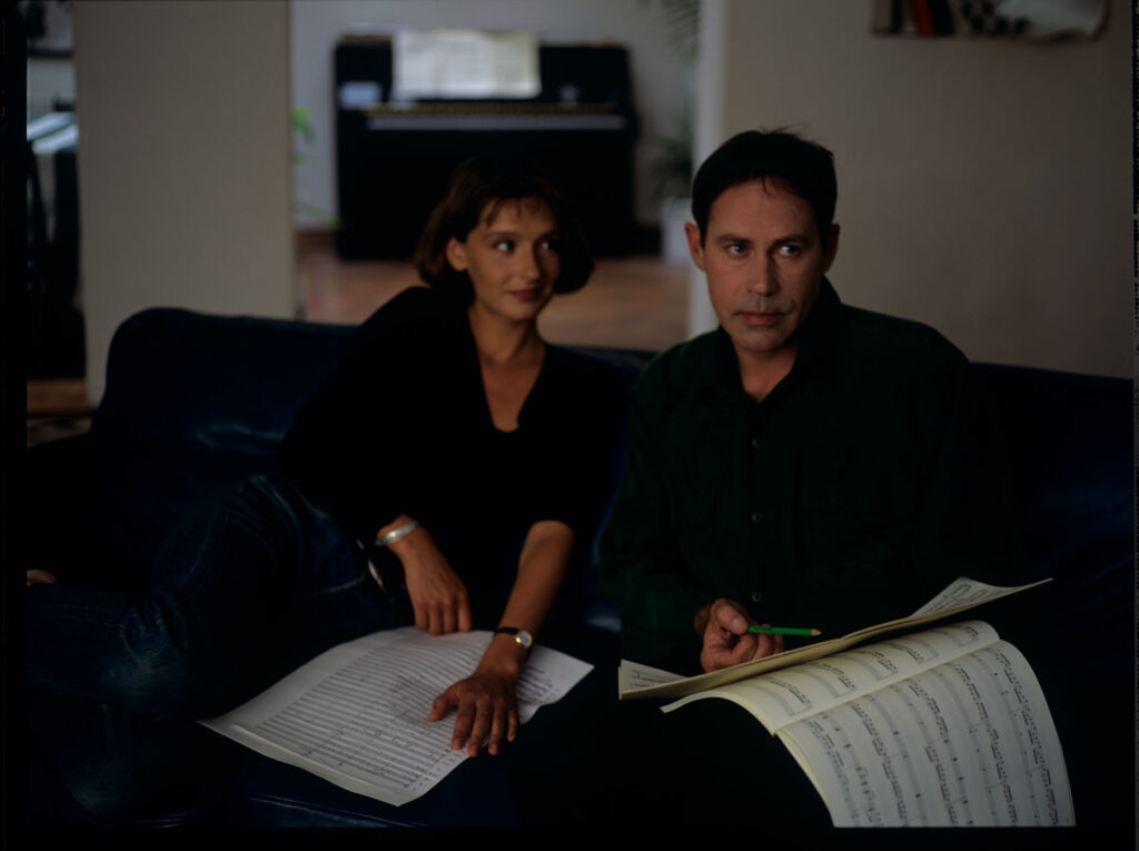 Composer Patrice de Courcy (Hugues Quester) accompanied by a copyist (Vignon Florence).