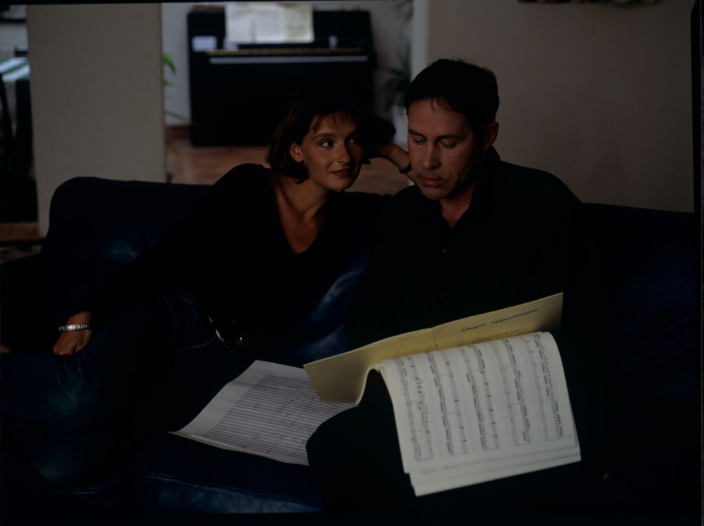 Composer Patrice de Courcy (Hugues Quester) accompanied by a copyist (Vignon Florence).