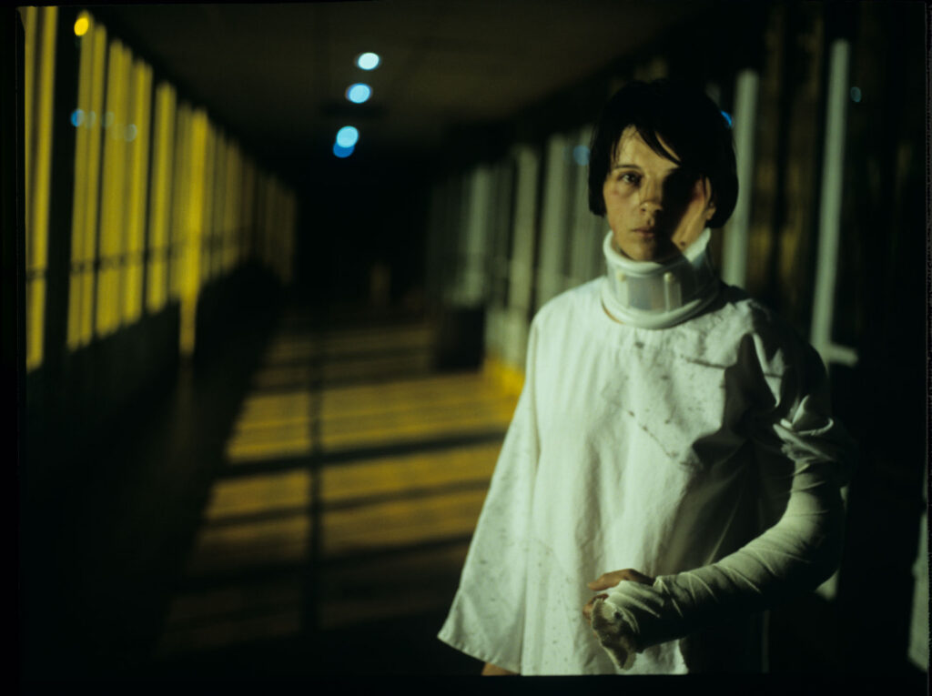 Julie (Juliette Binoche), in the hospital after a tragic car accident in which her husband and daughter died.