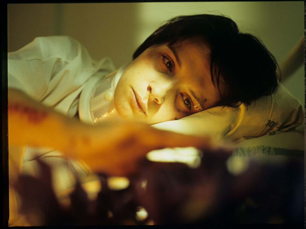 Julie (Juliette Binoche) in the hospital after a tragic car accident in which her husband and daughter were killed.