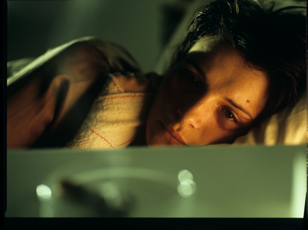 Julie (Juliette Binoche) in the hospital after a tragic car accident in which her husband and daughter were killed.