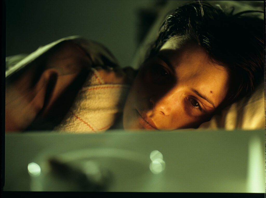 Julie (Juliette Binoche) in the hospital after a tragic car accident in which her husband and daughter were killed.