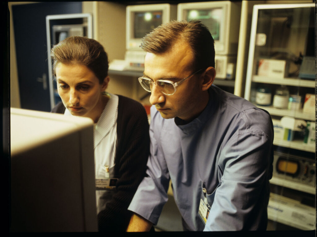 A doctor and a nurse (Idit Cebula) monitor a patient's vital signs in the hospital.
