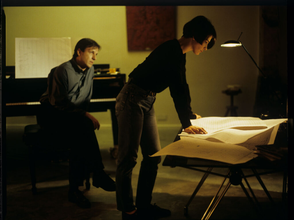 Olivier (Benoit Regent) and Julie (Juliette Binoche) while working on the completion of oratorio.