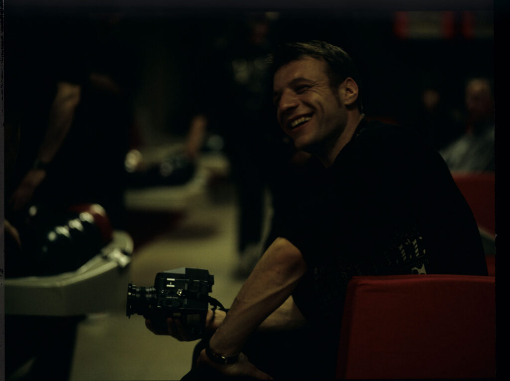 Samuel Le Bihan (playing the photographer) on the bowling alley set.