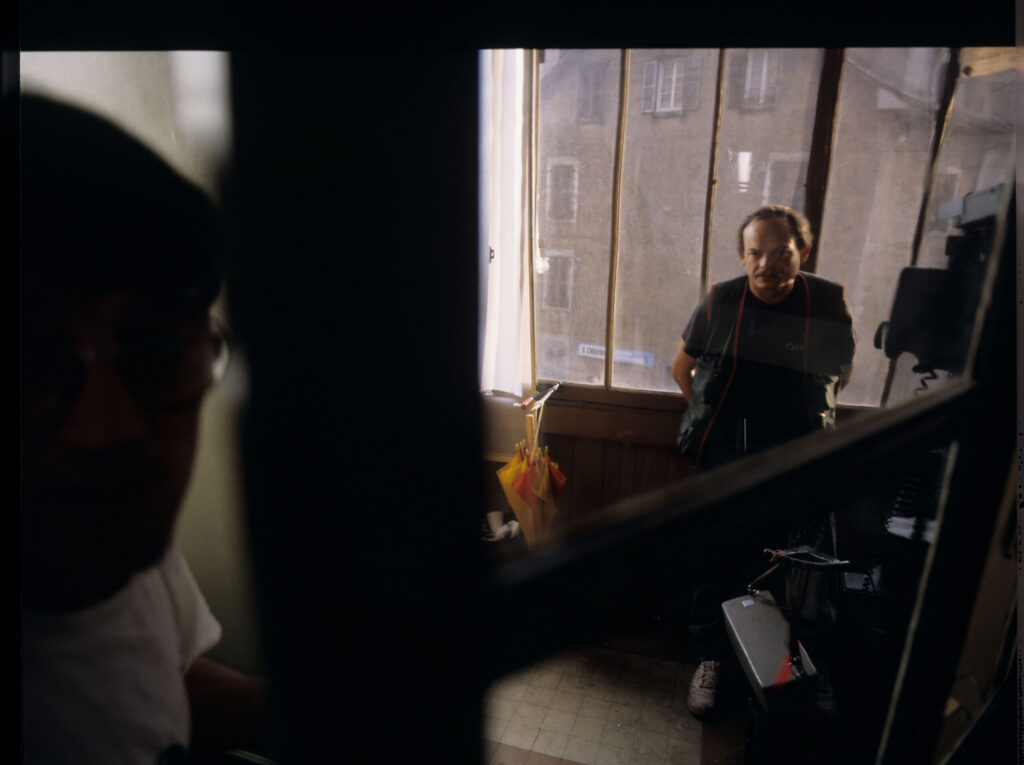 Henryk Jedynak (co-director) on the set in the stairwell in front of Valentine's apartment.