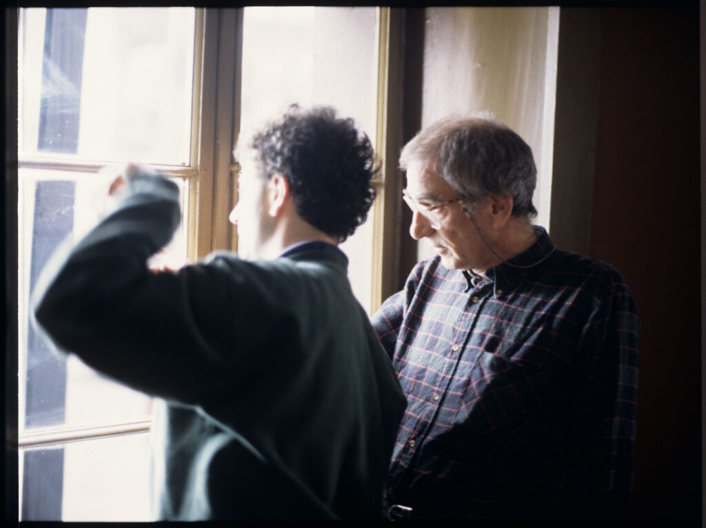 Krzysztof Kieślowski (director) and his assistant Emmanuel Finkiel on the set.