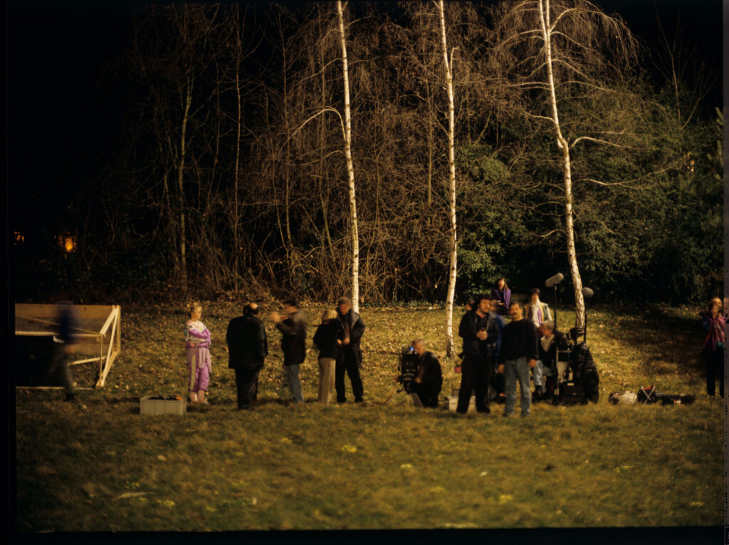 The crew on the set waiting for the next take.