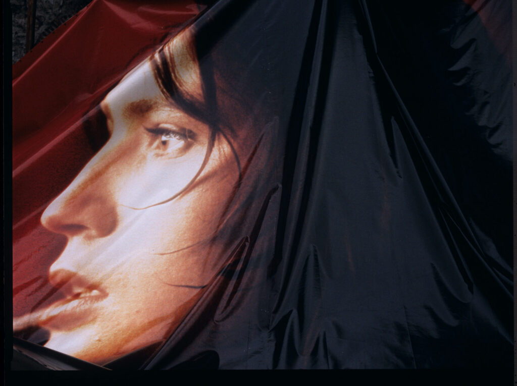 Dismantling of an advertising billboard with the image of Valentine - the main character of the film.