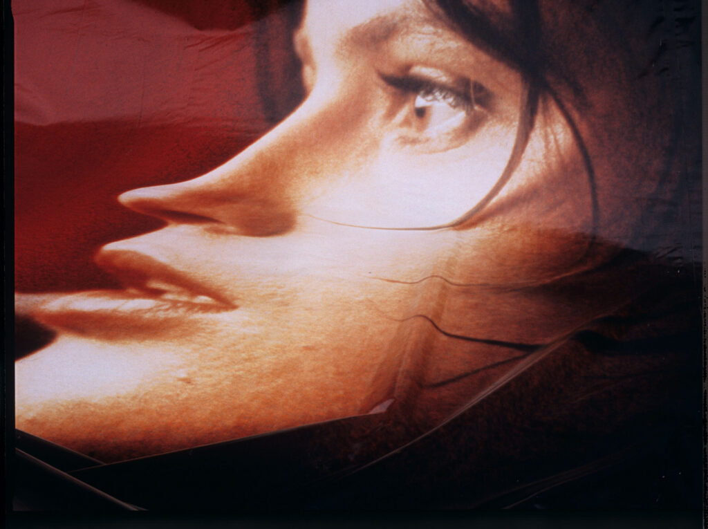 Dismantling of an advertising billboard with the image of Valentine - the main character of the film.