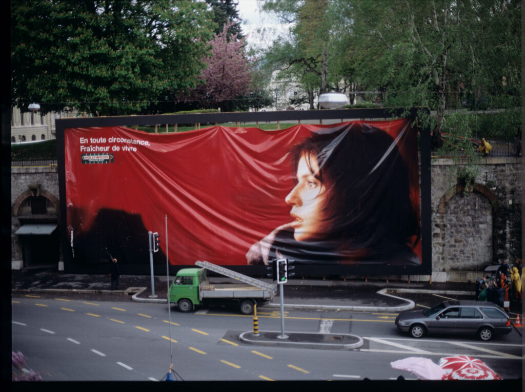Dismantling of an advertising billboard with the image of Valentine - the main character of the film.
