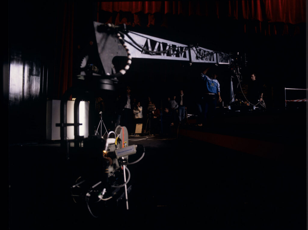 The crew preparing to shoot a fashion show scene in the theater.