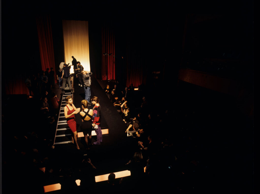 Filming a fashion show scene at the theater featuring Valentine. Actress Irène Jacob as Valentine on the set.
