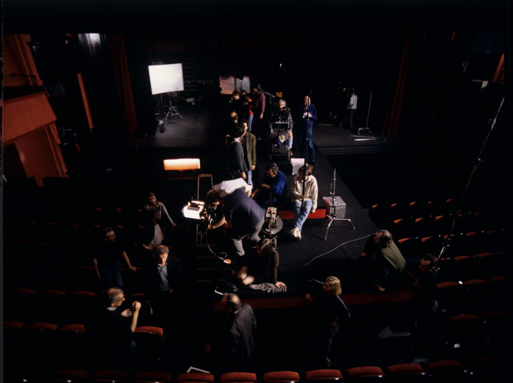 The crew on set at the theater after Valentine's fashion show. In the photo are members of the film crew.