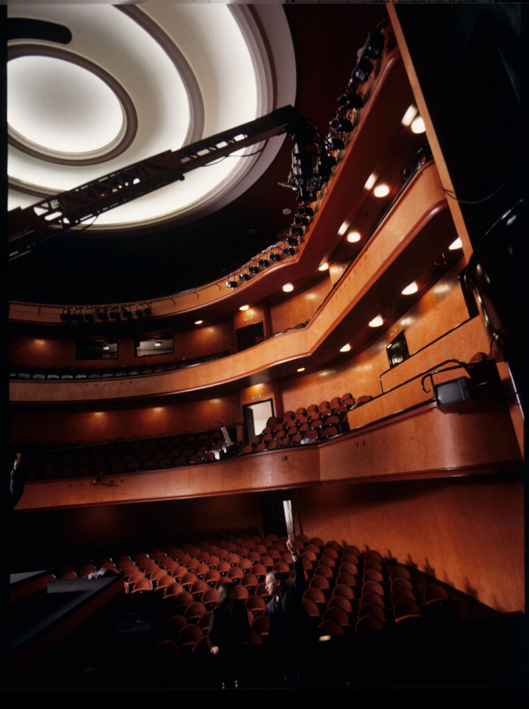 Crew on set at the theater during filming of the meeting scene between Valentine and the judge. Film crew visible.